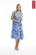 Hayman Blue Sleeveless Boho Dress Blue on display, showcasing vibrant colors and a breezy silhouette perfect for summer.