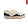 Minx Stitched Band side view showing the unique waffle fabric and leather upper on a stylish sneaker.