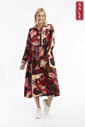 Chandalier Dress Collar model showcasing a stylish maxi dress with vibrant prints and a button-through front.