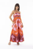 Celeste Orange Strappy Dress with beautiful patterns worn by a smiling model, perfect for summer outings.