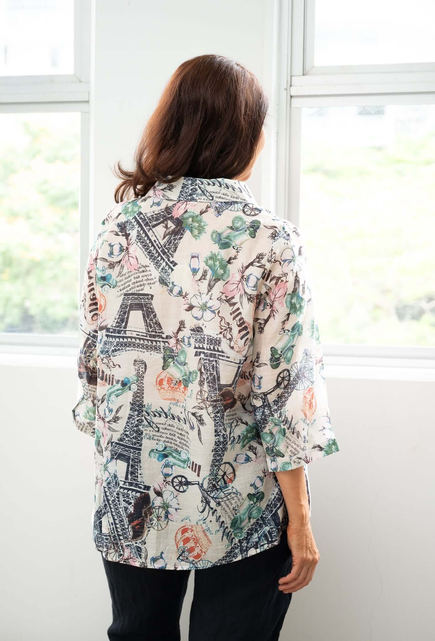Back view of woman wearing WT Suzy Eiffel tower Shirt with Parisian design, showcasing the lightweight fabric and collar.
