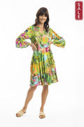 Lani Dress 3/4 sleeve with vibrant tropical prints and 3/4 frill sleeves, perfect for summer fun.