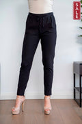 WT Slouch Pants displayed on a model, showcasing a stylish black color and tie waist design, perfect for casual wear.