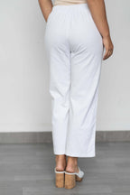Back view of WT Stretch pant in white, showcasing the chic design and comfortable fit.