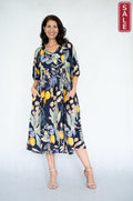 WT Garden Party Dress Dark navy on sale featuring floral and citrus patterns with pockets.