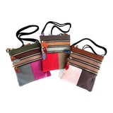 Multi Leather XBody - vibrant leather crossbody bags in random colorways with zip pockets for secure storage.