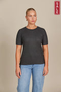 Juliette top graphite model wearing a stylish rib-knit short sleeve top, perfect for casual or chic outfits.