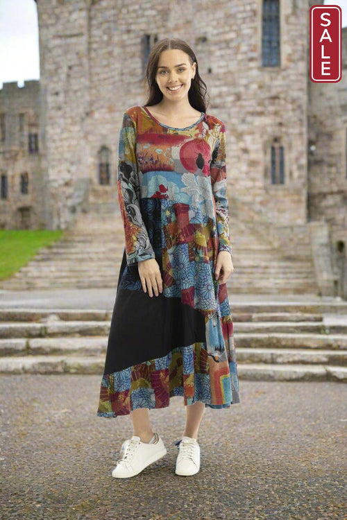 Billie Jean Dress Maxi Patch in vibrant patchwork design worn by a model, showcasing its stylish maxi length and long sleeves.