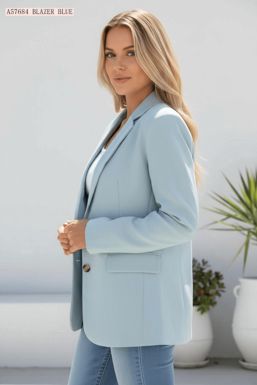 Aurora Blazer in light blue, showcasing timeless tailoring and modern elegance for versatile style.
