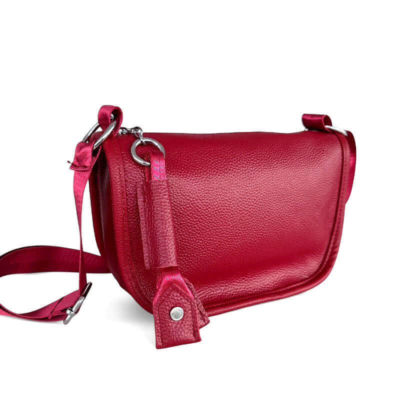 Kate Leather Bag in rich red color with adjustable strap and elegant design, perfect for stylish outings.