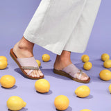 Bride Sandal  Pastel -Pink showcased against fresh lemons for a chic summer look.