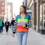 Sandra Striped Cardigan in vibrant colors, featuring stripes and an edge-to-edge design, perfect for cozy style.