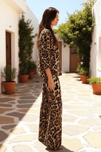 Giada Animal Print Tunic styled with a relaxed fit in an outdoor setting, showcasing elegant animal print details.