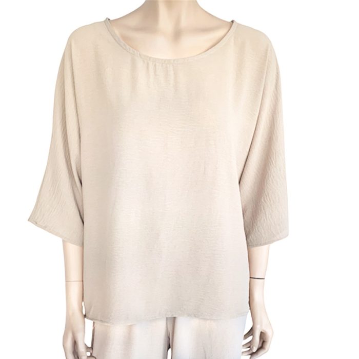 Eva Crew Neck top in cream color featuring 3/4 sleeves, perfect for stylish casual wear.