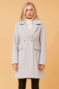 Theresa Faux fur collar coat in light gray with double-breasted design and notched lapels on a model.