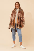 Model wearing Francisco Coat Brown, Italian-made with a relaxed open front and classic collar, perfect for layering.
