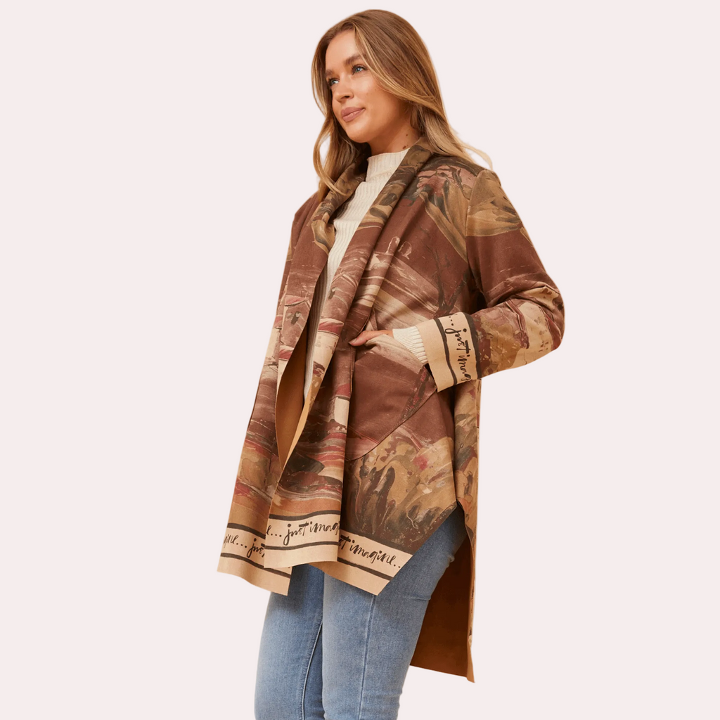 Model wearing Francisco Coat Brown showcasing its elegant design and relaxed fit.