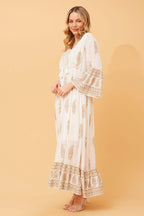 Ketia Tiered Dress in Mystic Monsoon Cream with gold details and flared sleeves, perfect for special occasions.