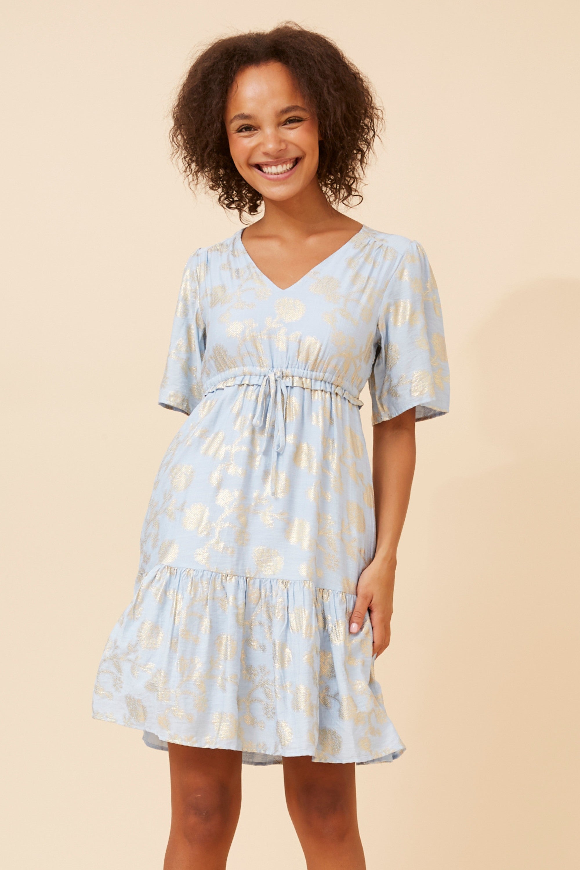 Gold Foil Dress in pale blue featuring gold foil print, V-neckline, and flowing comfort for warm weather.