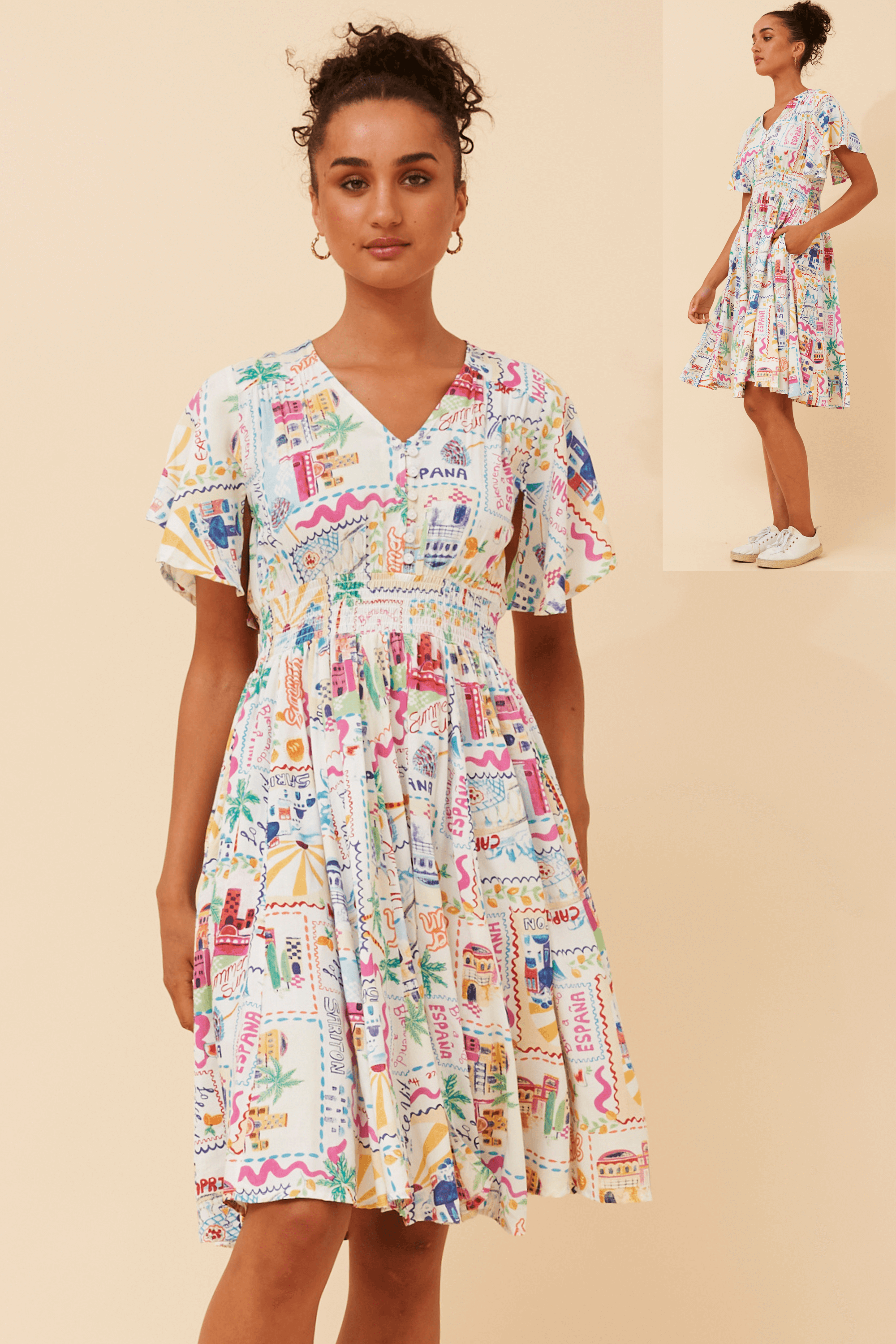 La Dolce Vita Dress featuring Mystic Monsoon print and short flutter sleeves, ideal for summer occasions.