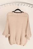 WL Fiorella Jumper on a hanger, showcasing luxurious alpaca blend fabric and feminine frill cuffs.
