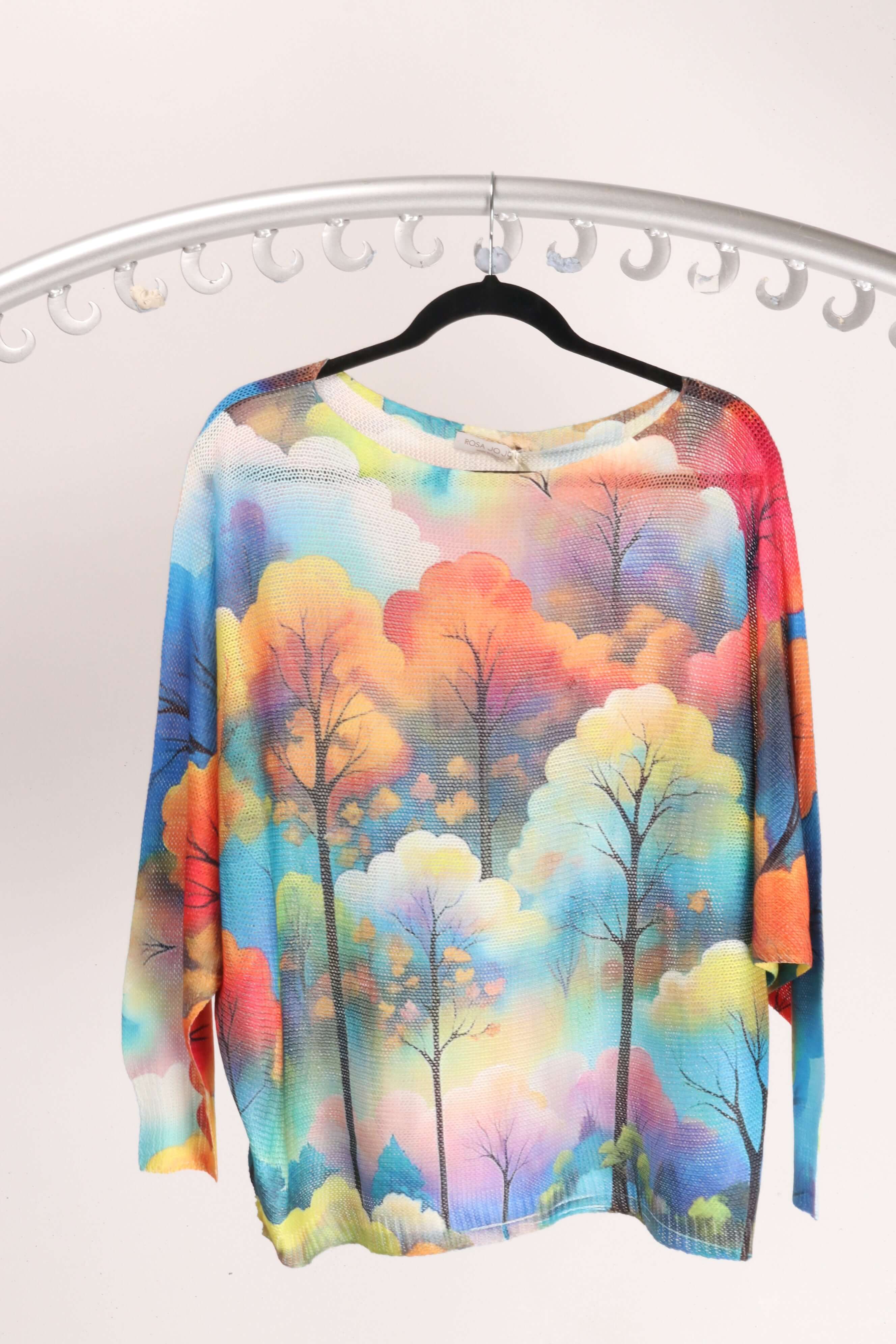 Tree Knitted top featuring a vibrant forest print in an array of colors, perfect for autumn style.