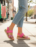 Fari slingback pink/cheetah worn by a woman on the street, showing the stylish design and 30 mm heel.