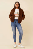 Model showcasing the Crissy Teddy jacket over a graphic tee and jeans, perfect for casual outings and stylish warmth.