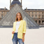 Limoncello Linen Blazer by Caroline Morgan worn in front of the Louvre, showcasing vibrant yellow elegance.