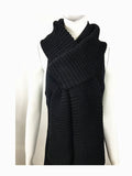 Kamala Knitted Scarf displayed on a mannequin, showcasing its soft knitted texture and elegant design.