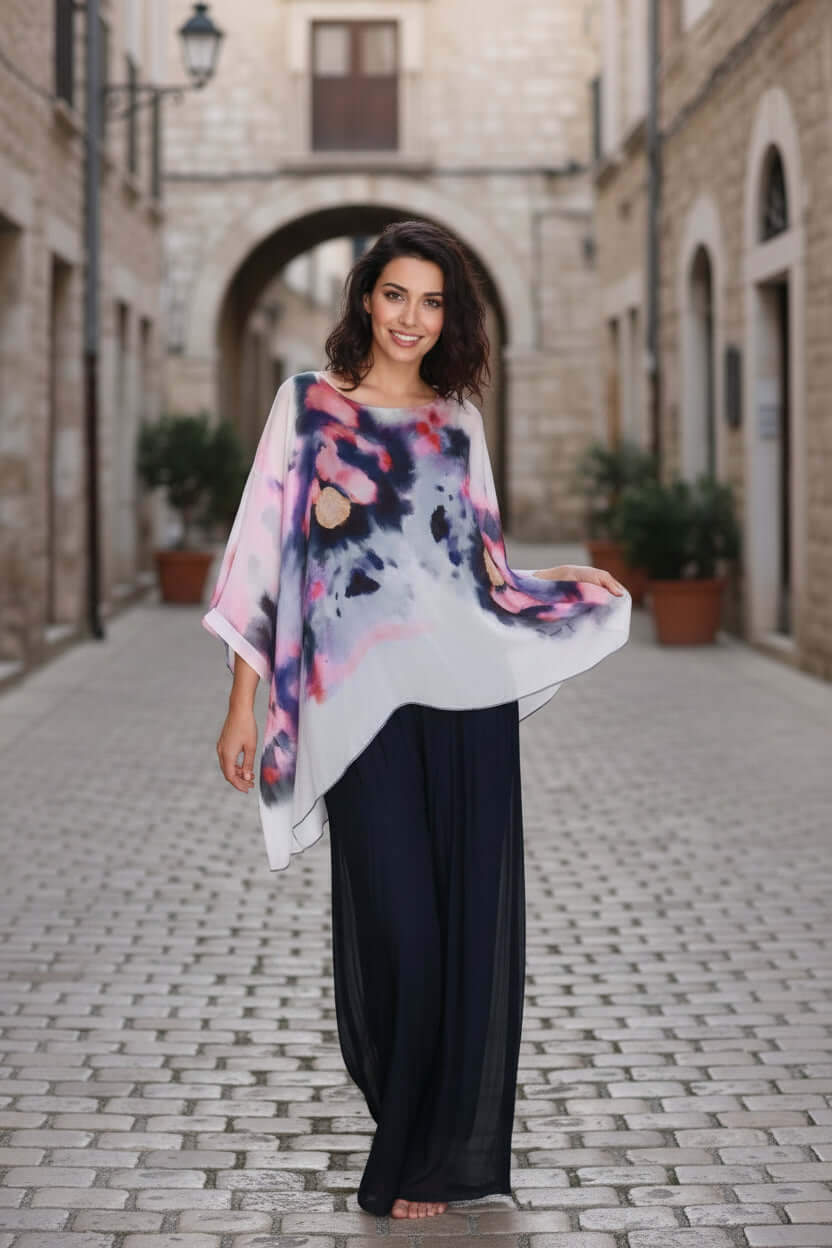 Model wearing a stylish Lovisa Silk Top, showcasing a beautiful watercolor design paired with elegant black pants.