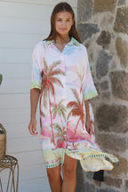 Isabella Shirt Dress featuring vibrant palm tree print, perfect for casual summer outings and beach days.