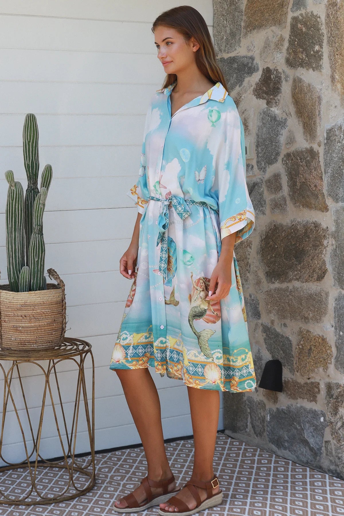 Cameron Shirt Dress featuring a breezy design, contrast print, and tie waist, perfect for island vibes.