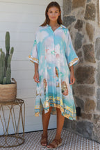 Cameron Shirt Dress in light blue with seashell prints, featuring a button front and roomy cut for a casual chic look.
