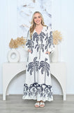 Palm Dress featuring long sleeves, V-neckline, drawstring waist, and navy palm print on off-white fabric.