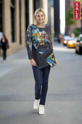 Woman wearing New York Tunic Patch with abstract prints walking on city street, fashion sale alert.