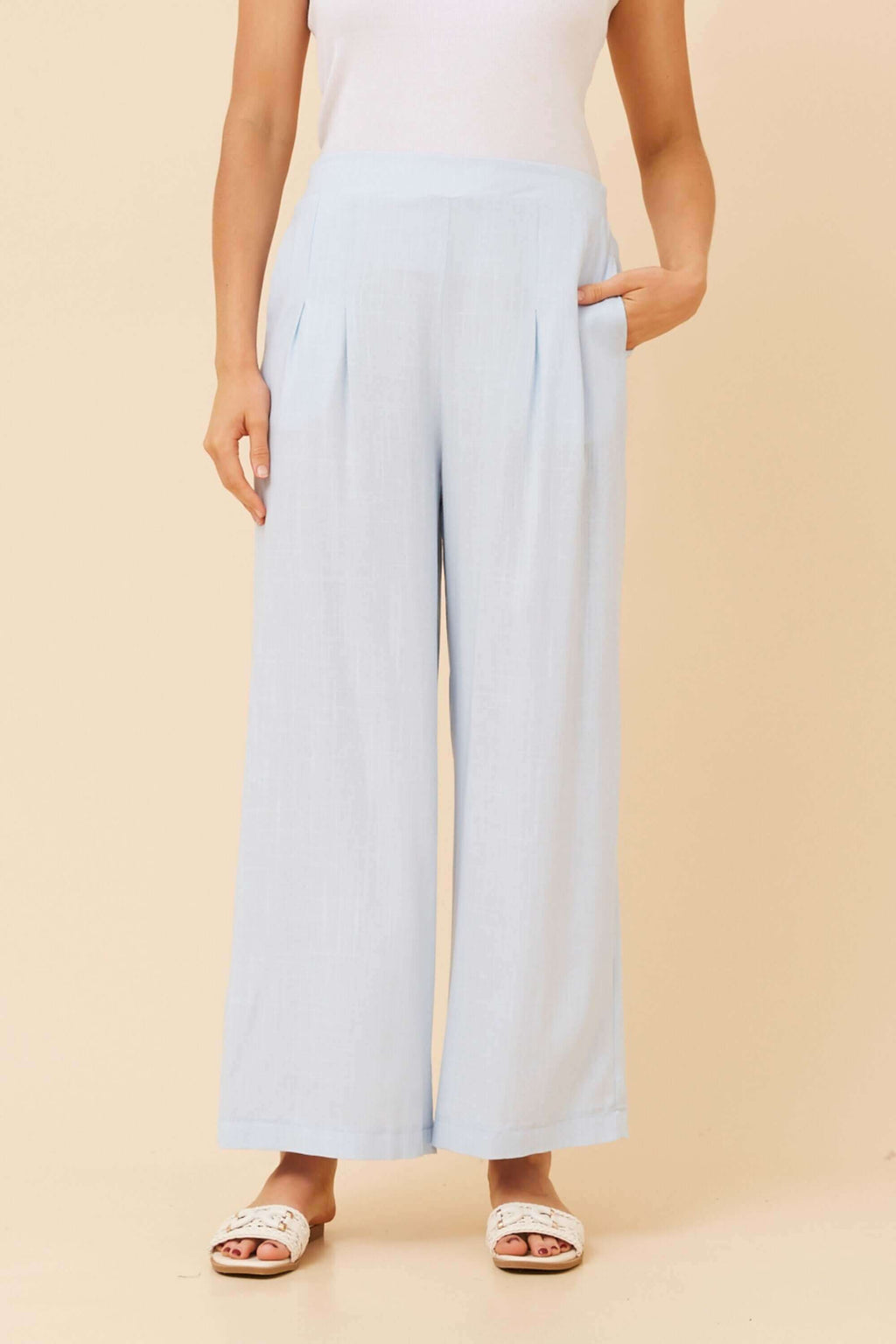 Linen Blend Wide Pants in light blue with elegant pleating and pockets for summer style.