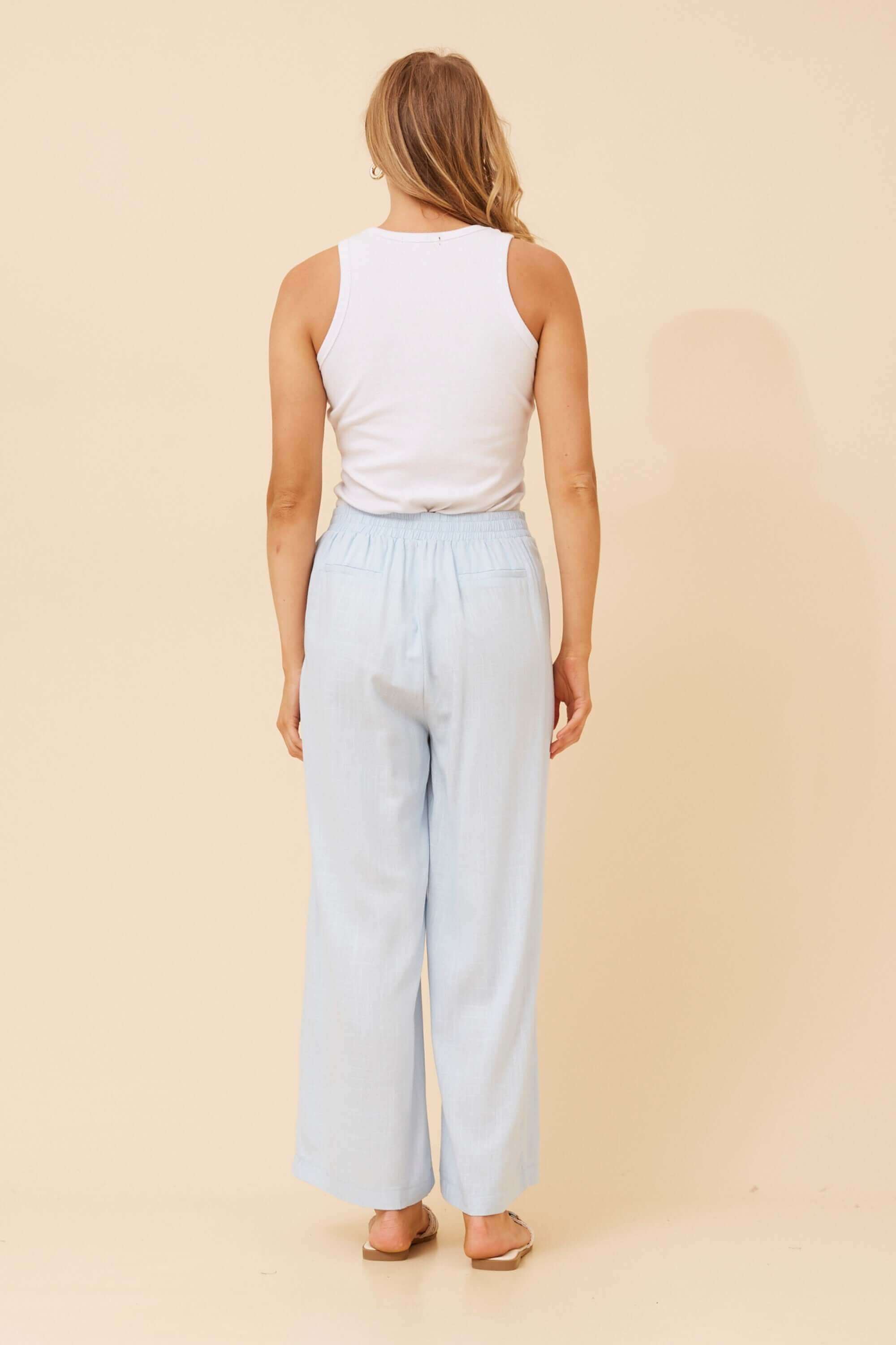 Linen Blend Wide Pants in light blue, featuring wide legs and a relaxed fit, perfect for warm weather styling.