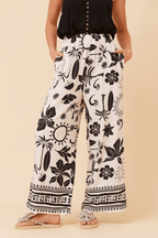 Bahama Pants featuring a striking cream base with bold black print and wide leg silhouette for all-day comfort.