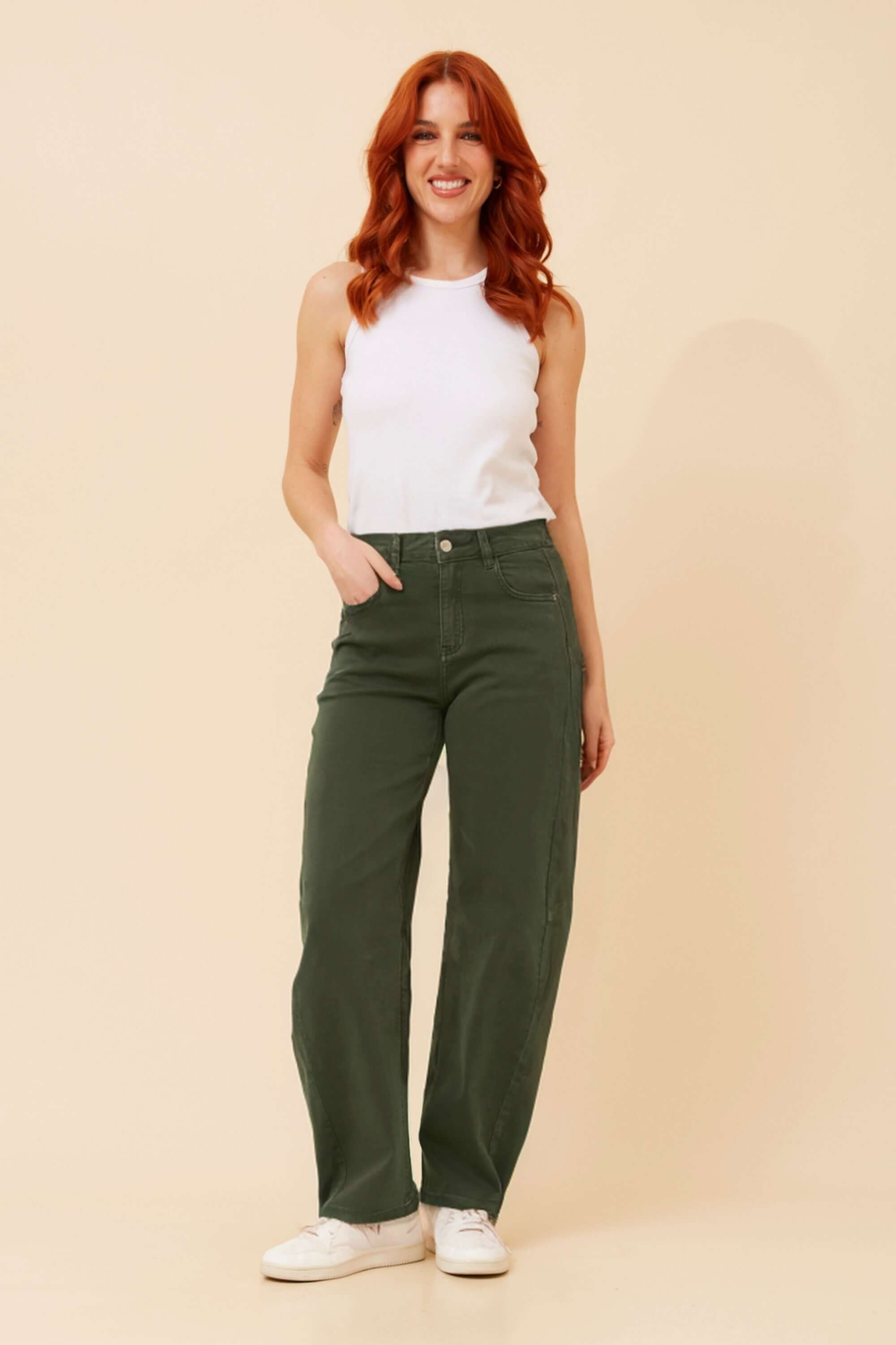 Model wearing Annika Barrel Jean in khaki, showcasing contemporary style and a relaxed fit.