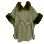 Anya Cape featuring luxurious faux fur trim and belt tie for a chic and cozy silhouette.