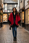 Luxe Curved Cape with Faux Fur Trim in red with black trim, perfect for stylish outfits, one size fits 8-20.