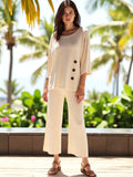 ATN Crop Pants in cream with wide-leg style, featuring buttons and a relaxed fit, perfect for summer outings.