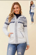 Iza Light blue Knit pullover with a cozy V-neckline and fun diamond pattern, perfect for layering and casual outfits.