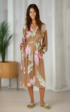 Ubud Maxi Dress – Mocha model showcasing the soft fabric and floral pattern, perfect for warm weather elegance.
