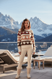 Wilma Heart jumper featuring a cozy heart motif against a stunning mountain backdrop.