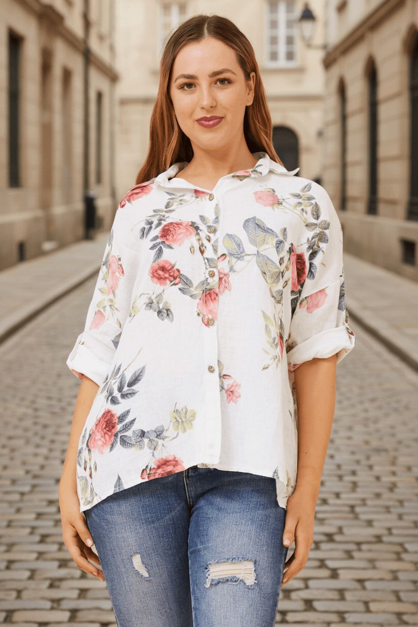Eira Roll up sleeve shirt by Bottega Moda, showing floral design and roll-up sleeves, perfect for warm weather.