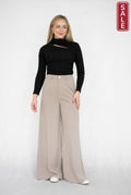 SIS Slit top Black worn with wide-leg pants, perfect for stylish outfits, now on sale.