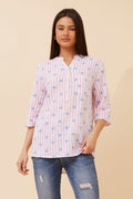 Nora Stripe Heart Shirt featuring rollup sleeves, textured cotton, and a buttoned design in pastel colors.