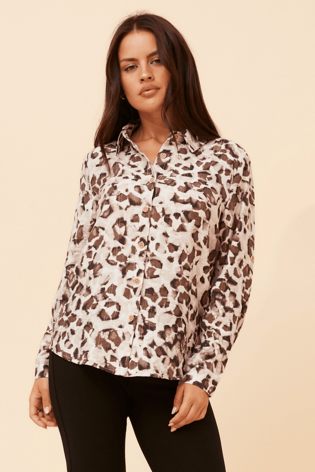 Chic and stylish Zola Leopard Shirt featuring a sophisticated leopard print design.